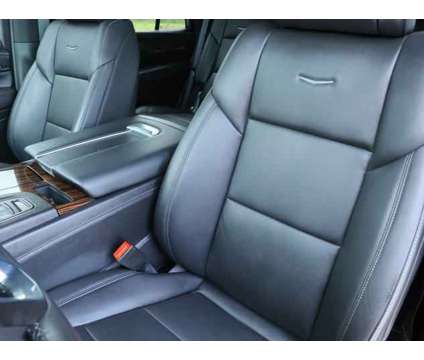 2023 Cadillac Escalade 4WD Luxury is a White 2023 Cadillac Escalade 4WD SUV in Friendswood TX