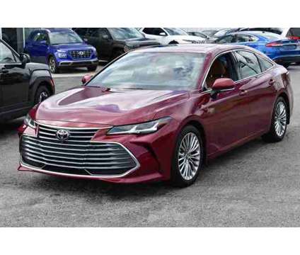 2019 Toyota Avalon XLE is a Red 2019 Toyota Avalon XLE Sedan in Lawrence KS