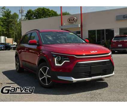 2024 Kia Niro LX is a Red 2024 Kia Niro LX Station Wagon in Queensbury NY