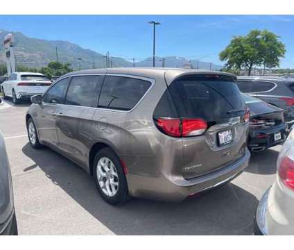 2018 Chrysler Pacifica Touring Plus is a Silver 2018 Chrysler Pacifica Touring Van in Ogden UT