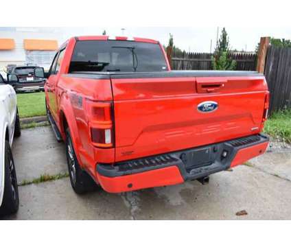 2020 Ford F-150 LARIAT is a Red 2020 Ford F-150 Lariat Truck in Lawrence KS