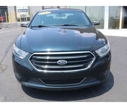 2014 Ford Taurus Limited is a Black 2014 Ford Taurus Limited Sedan in Lansing MI