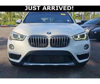 2017 BMW X1 sDrive28i is a White 2017 BMW X1 sDrive 28i SUV in Saint Augustine FL