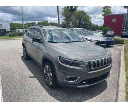 2022 Jeep Cherokee Limited is a Grey 2022 Jeep Cherokee Limited Car for Sale in Orlando FL