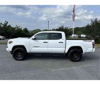 2023 Toyota Tacoma TRD Sport V6 is a Silver 2023 Toyota Tacoma TRD Sport Truck in Canton GA