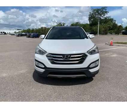 2016 Hyundai Santa Fe Sport 2.4L is a White 2016 Hyundai Santa Fe Sport 2.4L SUV in New Port Richey FL