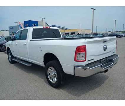 2021 Ram 2500 Big Horn Crew Cab 4x4 8' Box is a White 2021 RAM 2500 Model Big Horn Truck in Evansville IN