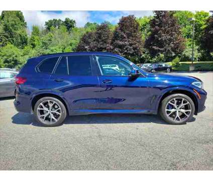 2021 BMW X5 M50i is a Blue 2021 BMW X5 4.6is SUV in Newton NJ