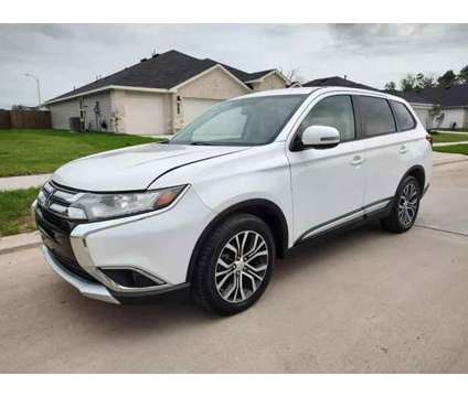 2016 Mitsubishi Outlander for sale is a White 2016 Mitsubishi Outlander Car for Sale in Houston TX