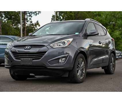 2015 Hyundai Tucson SE is a Grey 2015 Hyundai Tucson SE SUV in Denver CO