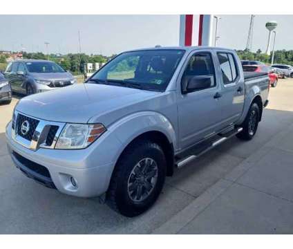2014 Nissan Frontier SV is a Silver 2014 Nissan frontier SV Car for Sale in Triadelphia WV