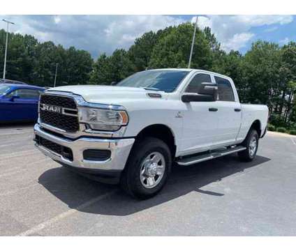 2024 Ram 2500 Tradesman is a White 2024 RAM 2500 Model Tradesman Truck in Wake Forest NC