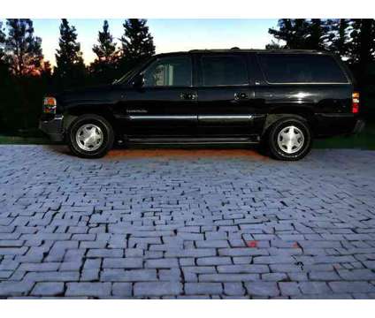 2003 GMC Yukon XL 1500 for sale is a Black 2003 GMC Yukon XL 1500 Trim Car for Sale in Duluth GA