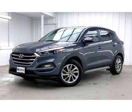 2018 Hyundai Tucson SEL is a Grey 2018 Hyundai Tucson SUV in Madison WI