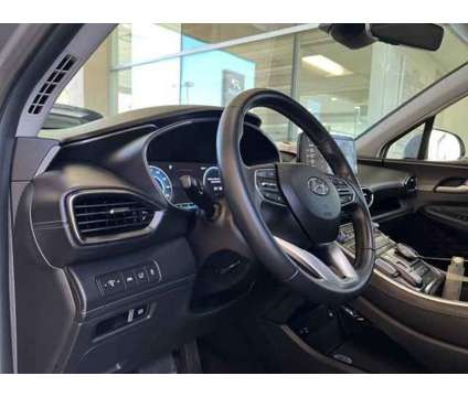 2023 Hyundai Santa Fe Hybrid SEL Premium is a Silver 2023 Hyundai Santa Fe Hybrid in Bakersfield CA