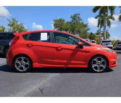 2015 Ford Fiesta ST is a Orange 2015 Ford Fiesta ST Hatchback in Estero FL