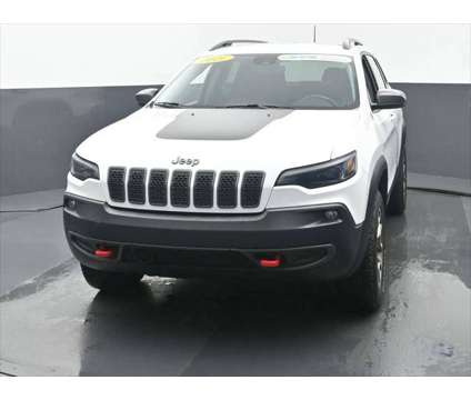 2021 Jeep Cherokee Trailhawk 4X4 is a White 2021 Jeep Cherokee Trailhawk SUV in Dubuque IA