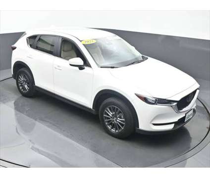 2021 Mazda CX-5 Touring is a White 2021 Mazda CX-5 Touring SUV in Dubuque IA