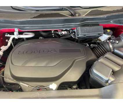 2022 Honda Passport AWD EX-L is a Red 2022 Honda Passport EX SUV in Dubuque IA