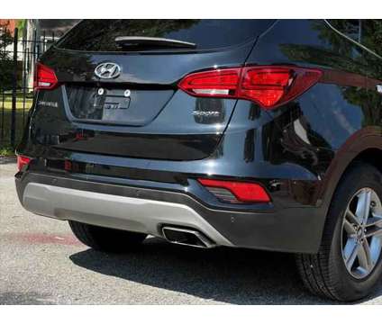 2017 Hyundai Santa Fe Sport 2.4L is a Black 2017 Hyundai Santa Fe Sport 2.4L SUV in Waldorf MD