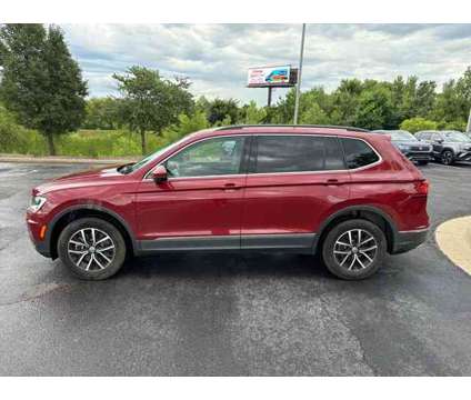 2021 Volkswagen Tiguan 2.0T SE is a Red 2021 Volkswagen Tiguan 2.0T S SUV in Lees Summit MO