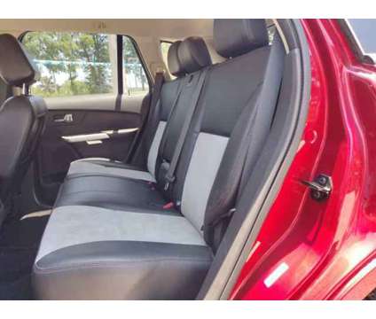 2013 Ford Edge SEL is a Red 2013 Ford Edge SEL SUV in Deland FL