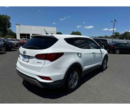 2018 Hyundai Santa Fe Sport 2.4L is a White 2018 Hyundai Santa Fe Sport 2.4L SUV in Shrewsbury NJ