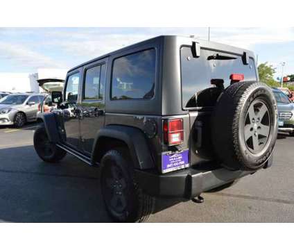 2017 Jeep Wrangler Unlimited Sport 4x4 is a Grey 2017 Jeep Wrangler Unlimited Sport SUV in Highland Park IL