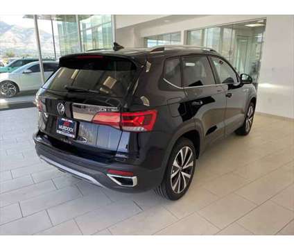 2023 Volkswagen Taos 1.5T SE is a Black 2023 SUV in Logan UT