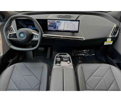 2025 BMW iX xDrive50 is a Grey 2025 BMW 325 Model iX SUV in Seaside CA