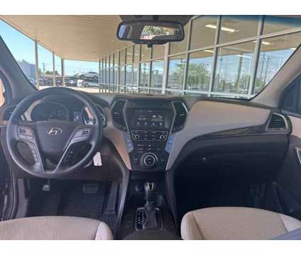 2017 Hyundai Santa Fe Sport 2.4L is a Silver 2017 Hyundai Santa Fe Sport 2.4L SUV in Wichita KS
