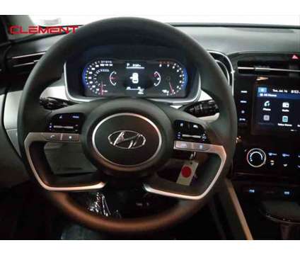 2024 Hyundai Tucson SE is a Blue 2024 Hyundai Tucson SE SUV in Wentzville MO