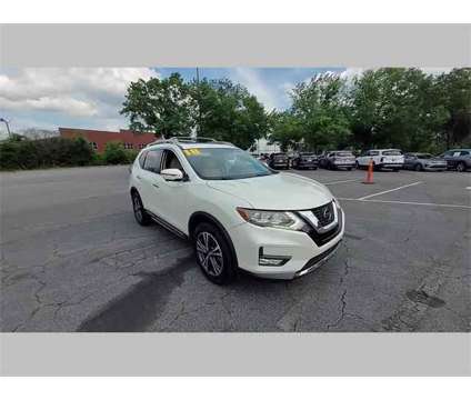 2018 Nissan Rogue SL is a White 2018 Nissan Rogue SL Station Wagon in Duluth GA