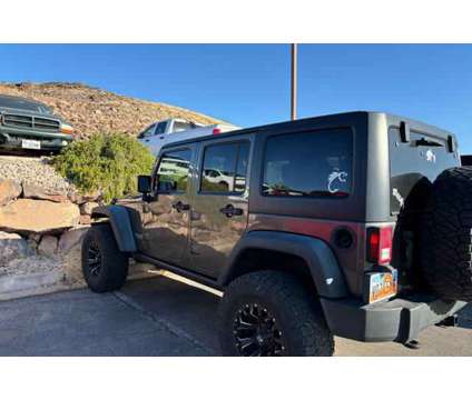 2017 Jeep Wrangler Unlimited Rubicon 4x4 is a Grey 2017 Jeep Wrangler Unlimited Rubicon SUV in Saint George UT
