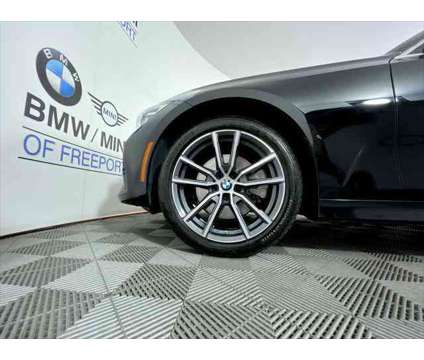 2021 BMW 3 Series xDrive is a Black 2021 BMW 3-Series Sedan in Freeport NY