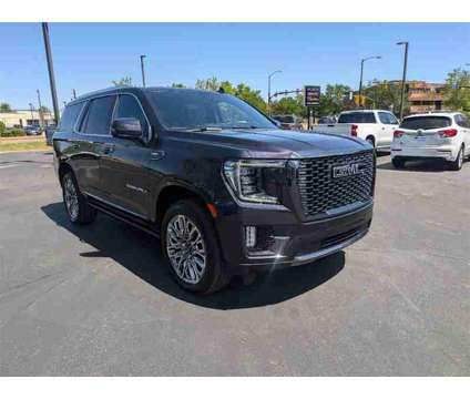 2024 GMC Yukon Denali Ultimate is a Silver 2024 GMC Yukon Denali SUV in Boulder CO