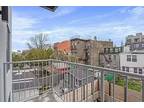 Extra large open layout + Balcony + in unit laundry 46 Stockholm St #3R