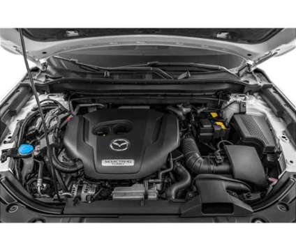 2024 Mazda CX-5 2.5 Carbon Turbo is a White 2024 Mazda CX-5 SUV in Lawrence KS