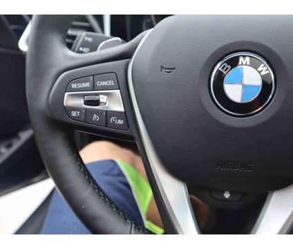 2021 BMW 3 Series xDrive is a Blue 2021 BMW 3-Series Sedan in Bay Shore NY