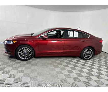 2018 Ford Fusion SE is a Red 2018 Ford Fusion SE Sedan in Pensacola FL