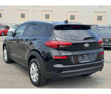 2021 Hyundai Tucson Value is a Black 2021 Hyundai Tucson Value SUV in Hempstead NY
