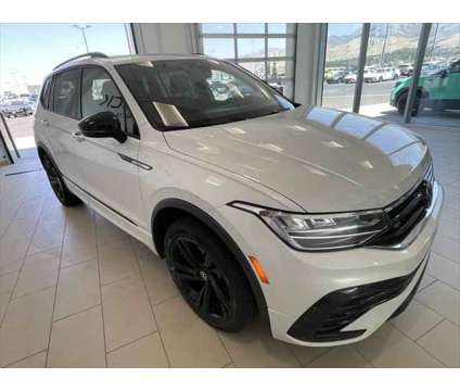 2023 Volkswagen Tiguan 2.0T SE R-Line Black is a White 2023 Volkswagen Tiguan 2.0T SUV in Logan UT