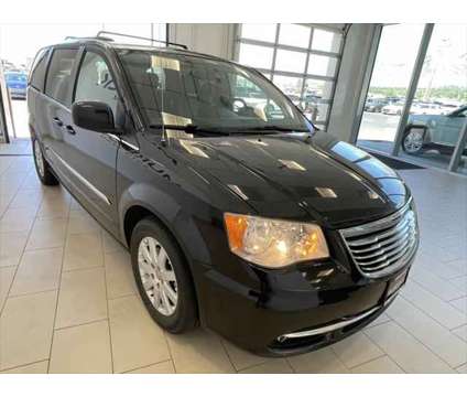 2014 Chrysler Town and Country Touring is a Black 2014 Chrysler town &amp; country Van in Logan UT