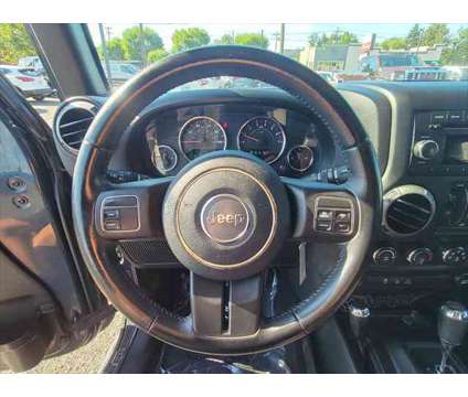 2017 Jeep Wrangler Unlimited Sport 4x4 is a Black 2017 Jeep Wrangler Unlimited Sport Car for Sale in Union NJ