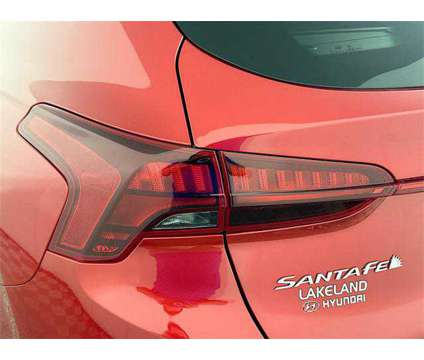 2023 Hyundai Santa Fe SE is a Red 2023 Hyundai Santa Fe SE SUV in Lakeland FL