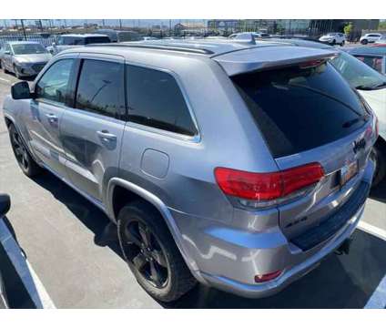 2014 Jeep Grand Cherokee Altitude is a Silver 2014 Jeep grand cherokee Altitude SUV in Lindon UT