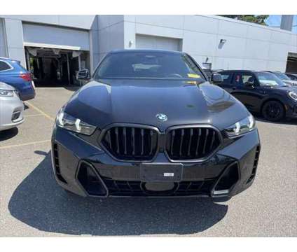 2024 BMW X6 xDrive40i is a Black 2024 BMW X6 SUV in Freeport NY