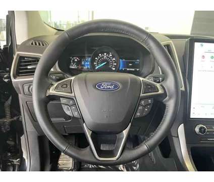 2024 Ford Edge SEL is a Black 2024 Ford Edge SEL SUV in Logan UT