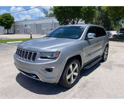2014 Jeep Grand Cherokee for sale is a Silver 2014 Jeep grand cherokee Car for Sale in Hallandale Beach FL