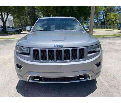 2014 Jeep Grand Cherokee for sale is a Silver 2014 Jeep grand cherokee Car for Sale in Hallandale Beach FL